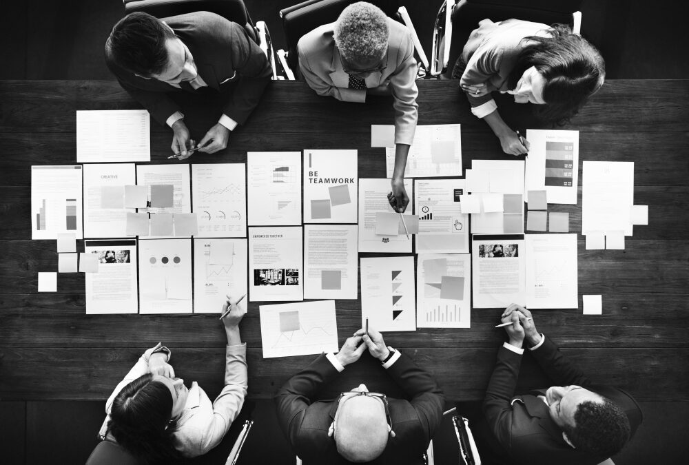 business people analyzing statistics financial concept